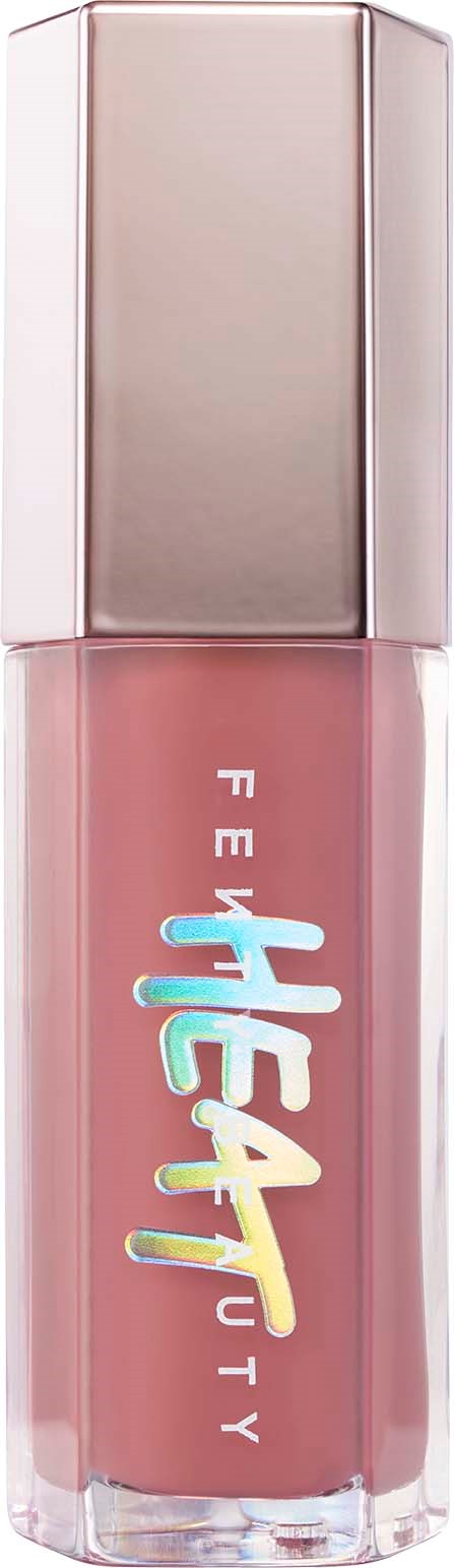 A lipstick tube with a pink cap and colorful text saying 'FEEL BEAUTY' on the bottle.