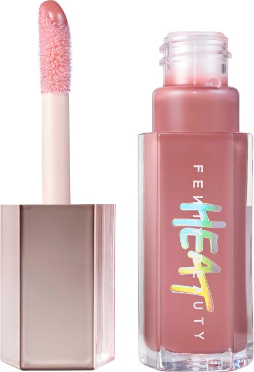 Lip gloss tube with a pink applicator. The bottle has colorful text saying 'Fenty Beauty.'