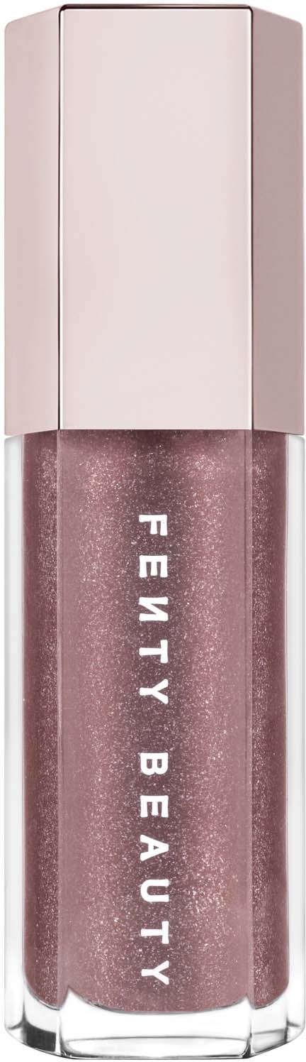 Läppglans i en rosa nyans med silverlock, märket är Fenty Beauty skrivet vertikalt.