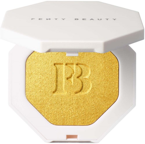 A yellow eyeshadow with embossed Fenty Beauty logo in a white compact case.