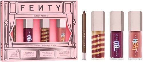 Fem läppar- och ansiktskrämer i rosa och guld förpackning från Fenty Beauty.