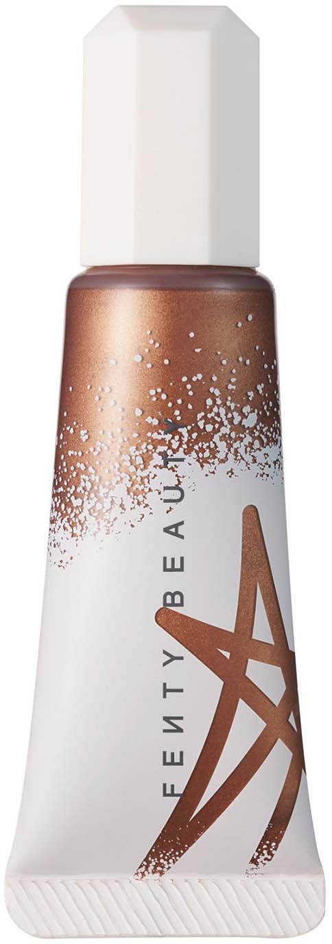 Eine Foundationtube mit weißem Deckel, brauner Farbe und Spritz- und Linienmuster.