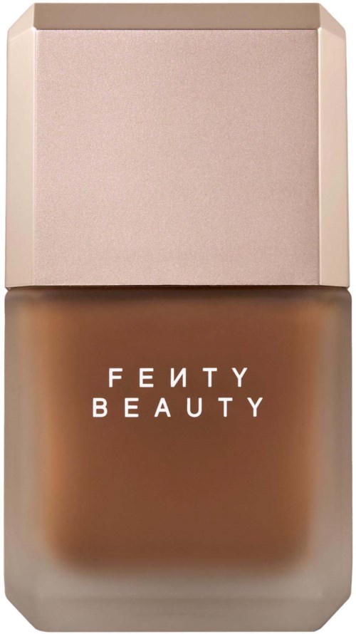 Fenty Beauty foundationflaska med beige lock och brunt innehåll.