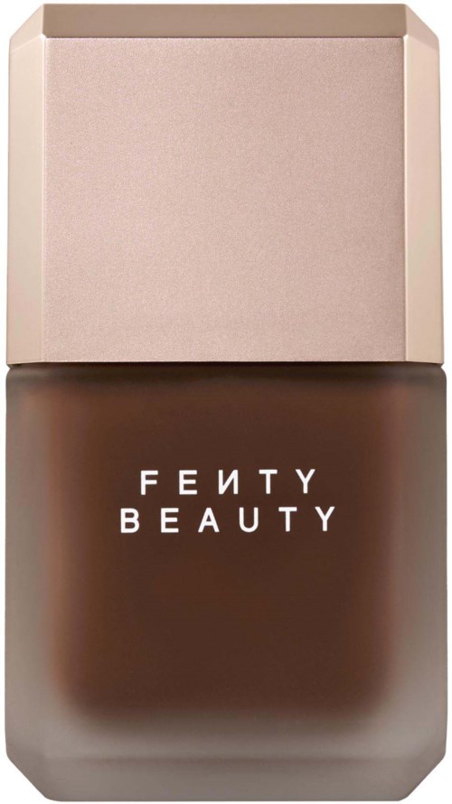 Fenty Beauty-foundationsflaska med beige lock och brunt flytande inuti.