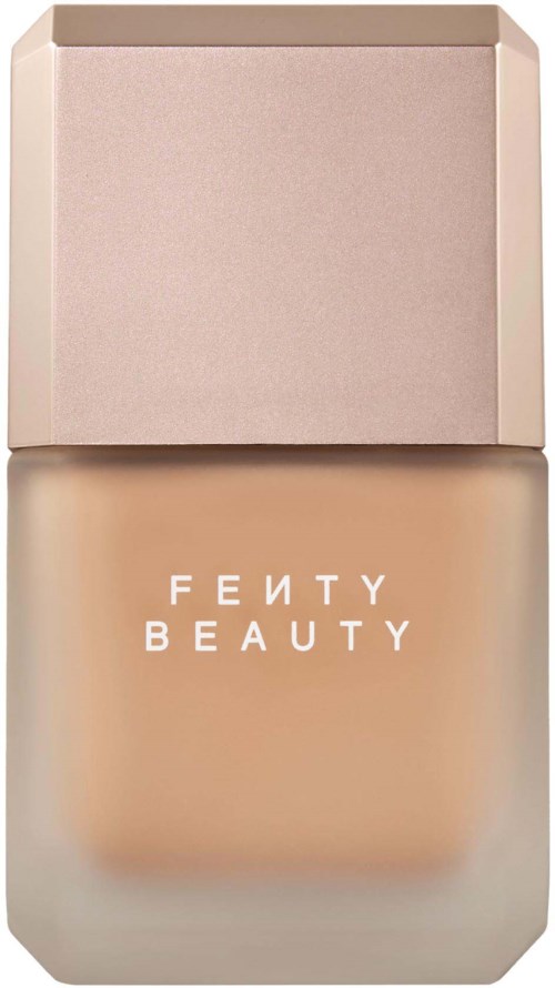 Fenty Beauty foundationflaska med beige lock och frostad glasbehållare.