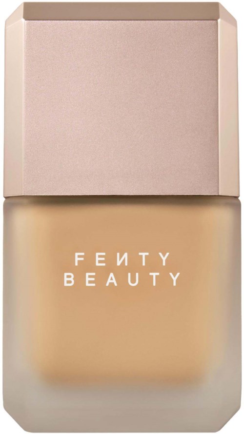 Fenty Beauty foundationflaska med beige lock och logotyp framtill.