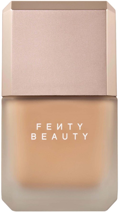 Fenty Beauty foundationflaska med beige lock och frostad glasbehållare.