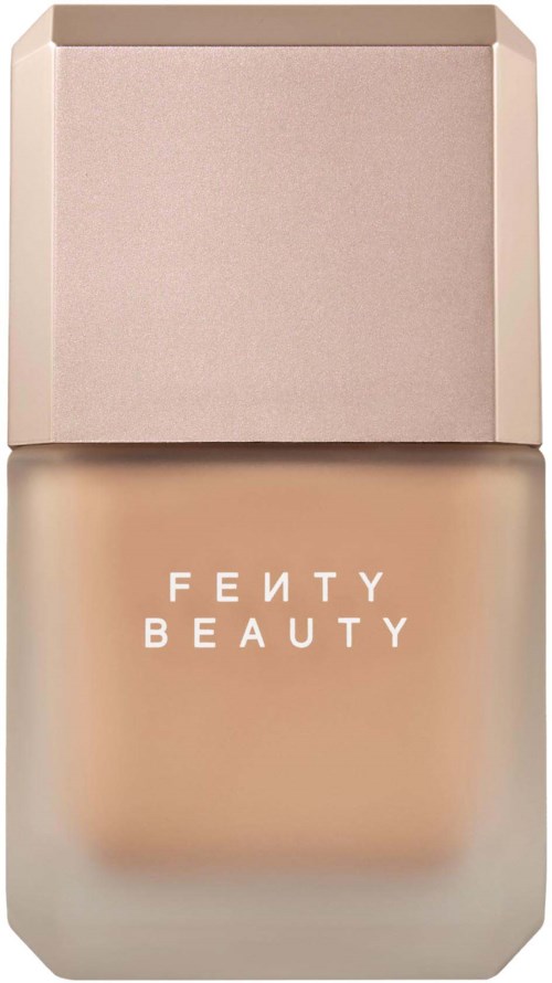 Fenty Beauty-foundationsflaska med beige lock och frostad glasbehållare.