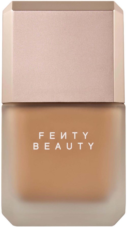 Fenty Beauty foundationflaska med beige lock och frostigt glas, logo på framsidan.