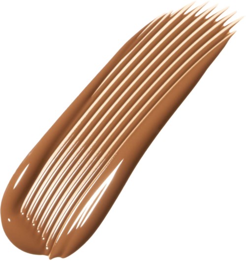 Swatch av ljusbrun foundationmakeup med jämn, blandad konsistens.