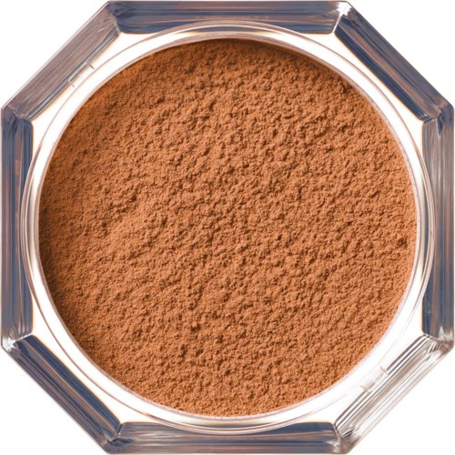 En liten burk med brunt ögonskuggspuder för makeup.