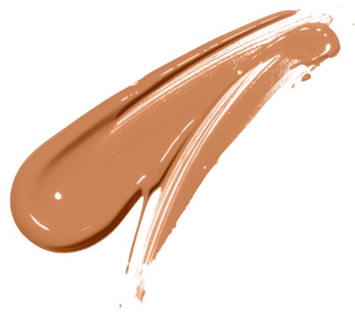 A smear of light brown makeup or foundation with a smooth, curved shape.