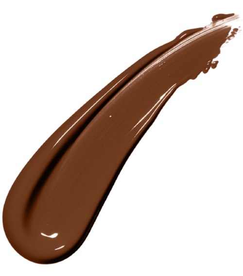 A thick swirl of brown, shiny, creamy substance on a white background.