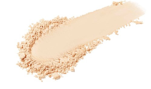En mängd beige pulver, spridd i en kurvad form, med lös pulver runt om.