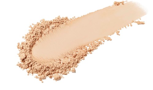 En beige pulver som är utbredd med lite pulver samlat runt den på en vit bakgrund.