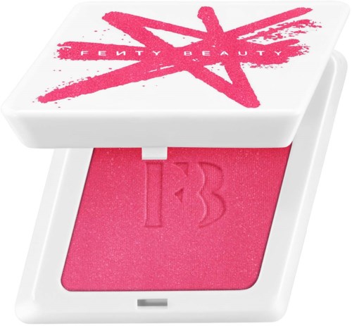 Pink blush compact with a white lid featuring a pink star and text. The blush has a number 13 engraved.