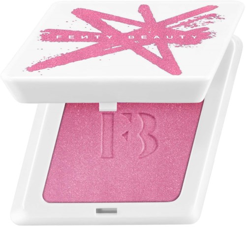Pink blush with embossed 'FB' logo inside a white compact case, featuring a graphic star and text on the lid.