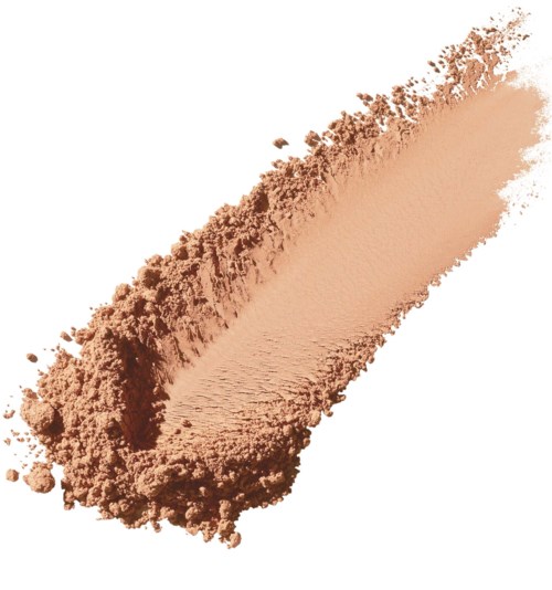 Vaalea beige-puuteripåle pöydällä, näyttää pehmeän tekstuurin ja matta pinnan.