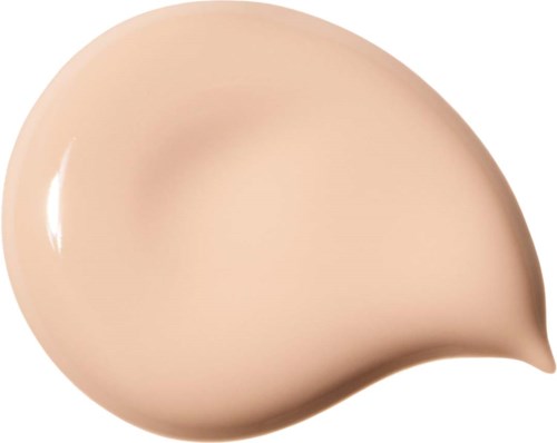 En ljusbeige vätskedroppe med glänsande yta och böjd form.