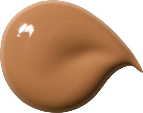 En slät beige vätskeform med glänsande yta och liten reflektion. Ingen text eller etikett.