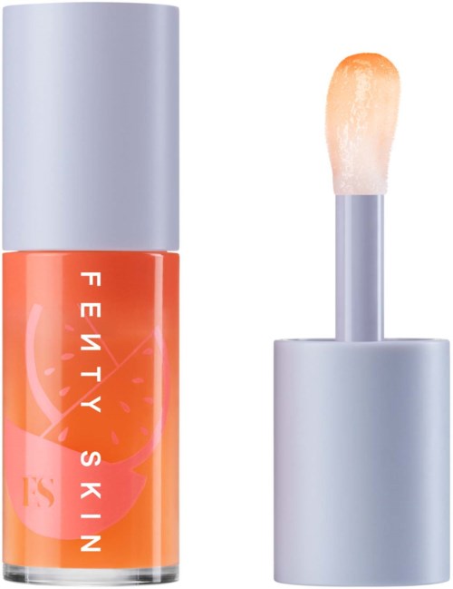 Läppglansrör med applikator, märkt 'Fenty Skin,' i orange och grå färger.