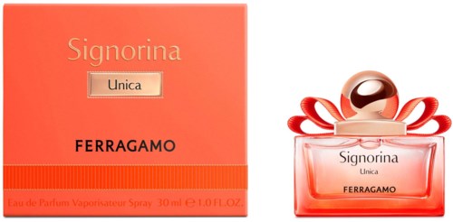 Eine Box und Flasche von Signorina Unica Parfüm von Ferragamo, rosa mit goldenen Akzenten und Schleife auf der Flasche.