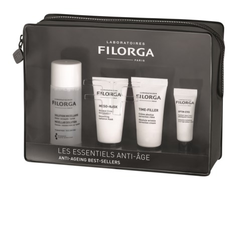 En svart pose med fire hudpleieprodukter fra Filorga, merket i hvitt, for anti-aldringspleie.