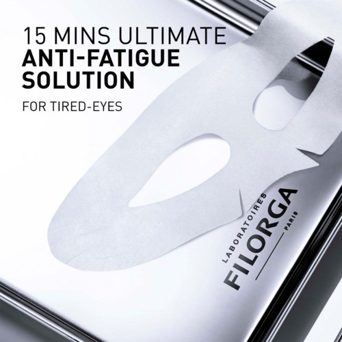 A skincare product box with a white sheet and text promoting anti-fatigue solution for tired eyes.