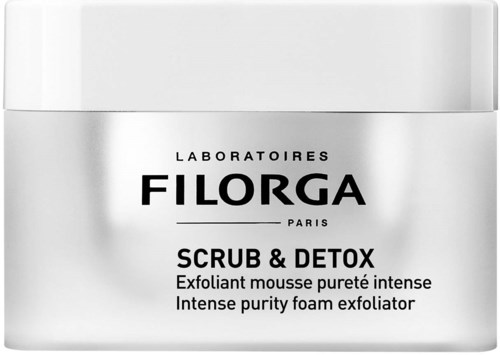 En hvit krukke med Filorga scrub & detox med svart tekst, som fremhever avgiftning og dyprengjøring for huden.