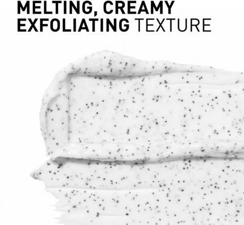 En krämig, smältande exfolierande skrubb med svarta prickar, visad i närbild i svartvitt layout.