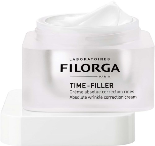 En vit burk av FILORGA Time-Filler mot rynkor, med kräm synlig ovanpå.