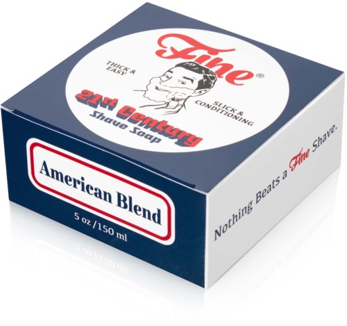 Een doos scheerzeep met de label 'American Blend' met een mannengezicht en slogan over droogheid en verzorging.