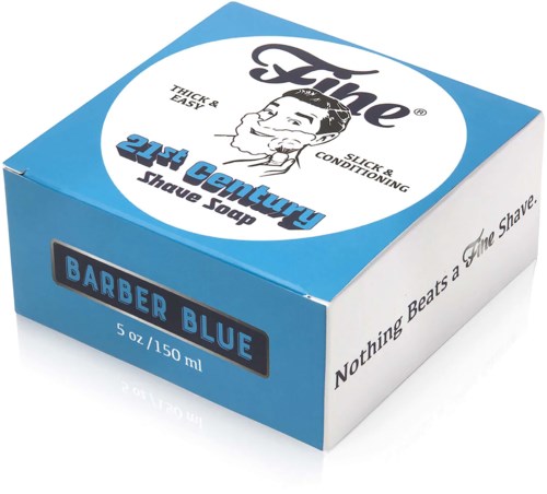 Een blauwe en witte doos met 2-in-1 scheerzeep voor dikke, makkelijke, gladde en conditionerende scheerbeurt. Het heet Barber Blue.