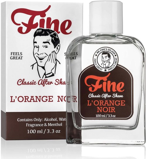 Hajustehostepullo, jossa lukee 'Fine L'Orange Noir' ja vintage-tyylinen muotoilu ja sarjakuvahahmo laatikossa.