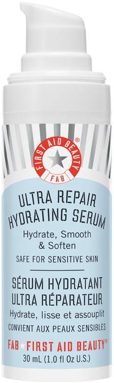En vit pumpflaska med Ultra Repair Hydrating Serum för känslig hud, med blå och röda etikettdetaljer.