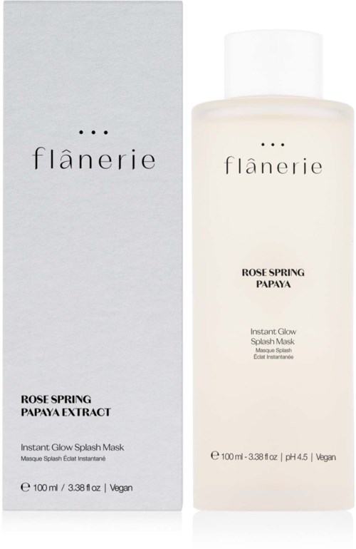 Ein Hautpflegeproduktflasche und Box mit der Aufschrift 'Flânérie' mit Rosenfrühling Paprikau extract und veganen Inhaltsstoffen.