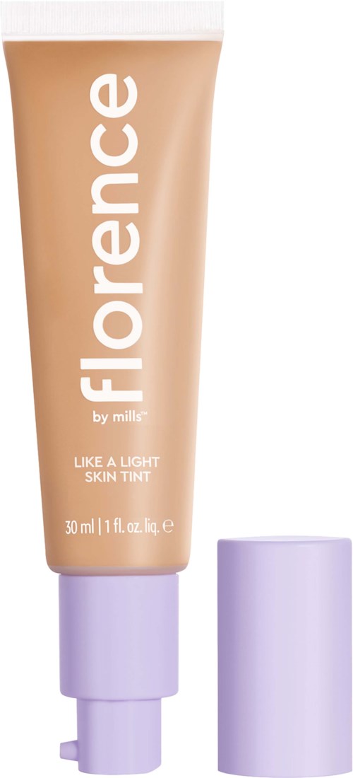 A tube of light skin tint makeup with purple cap, labeled 'Florence by mills', 30 ml size.