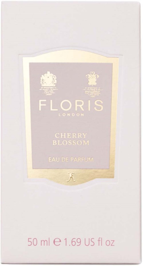 Białe pudełko z lawendową etykietą na perfumy Floris Cherry Blossom, 50 ml, symbole Paryża u góry.