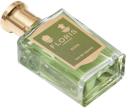 En glassparfyllflaska med grönt vätska, guldlock, och en beige etikett som säger 'Floris London, Elite, Eau de Toilette.'