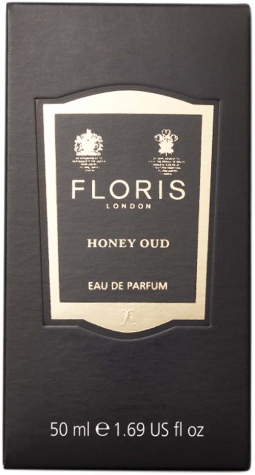 Eine schwarze Verpackung mit einem Etikett, das 'Floris London', 'Honey Oud' und 'Eau de Parfum' zeigt.