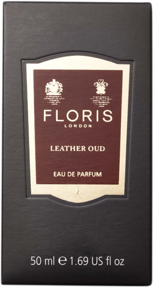 En svart boksom inneholder en etikett for Floris London Leather Oud Eau de Parfum, 50 ml, med detaljert tekst og symboler.