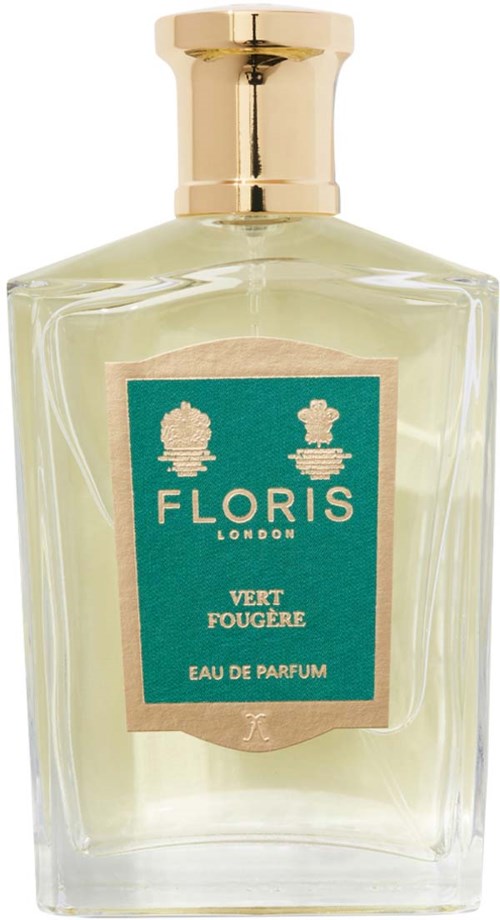 A perfume bottle with a gold cap, light green liquid inside, and a blue label with white text.