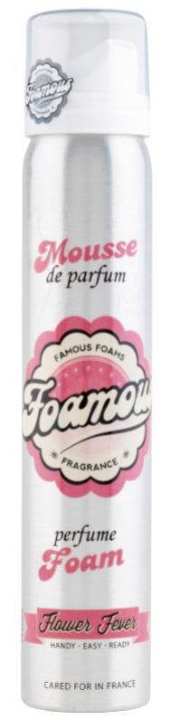 En vit parfümskumsspray med etikett 'Famous Foam' med rosa inslag och text, inklusive 'Mousse de parfum' och 'Flower Joy'.