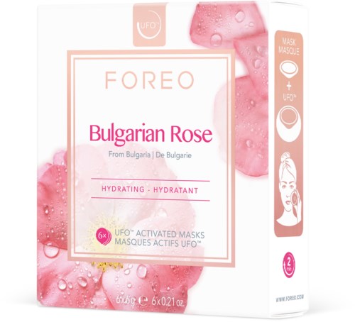 En hudvårdsproduktförpackning med bulgarisk ros, med bilder av rosor och instruktioner för en mask. Ren rosa och vit färg.