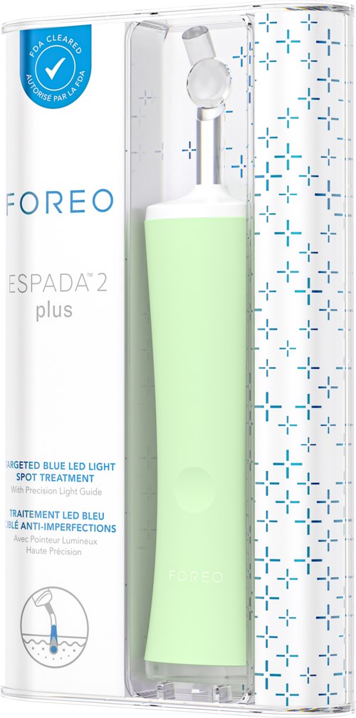 A green handheld device in a plastic box, labeled "FOREO ESPADA 2 plus," for skin treatment with blue LED light.