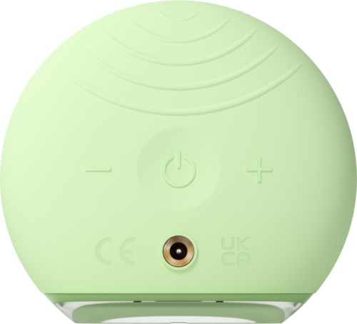 This is a round, light green device with buttons for power, volume, and a small round port or sensor.