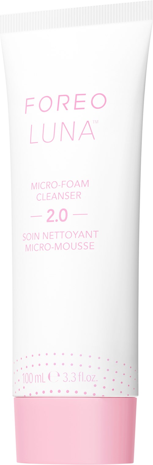 Valkoinen putki vaaleanpunaisella kannella, merkinnällä 'FOREO LUNA 2.0 Micro-Foam Cleanser.'