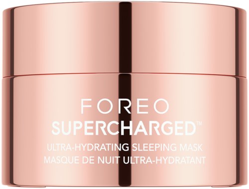 En rosa, glänsande burk med FOREO Supercharged Ultra-Hydrating Sleeping Mask för nattlig hudvård.