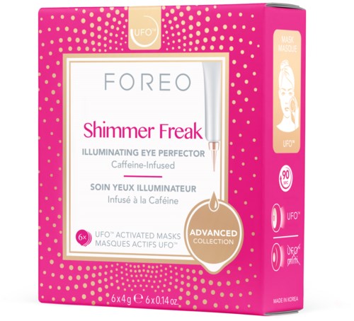 Rosa eske med gullfargede prikker, inneholder Foreo Shimmer Freak øyemasker og illustrert ansikt, tekst om koffein og UFO-aktivering.