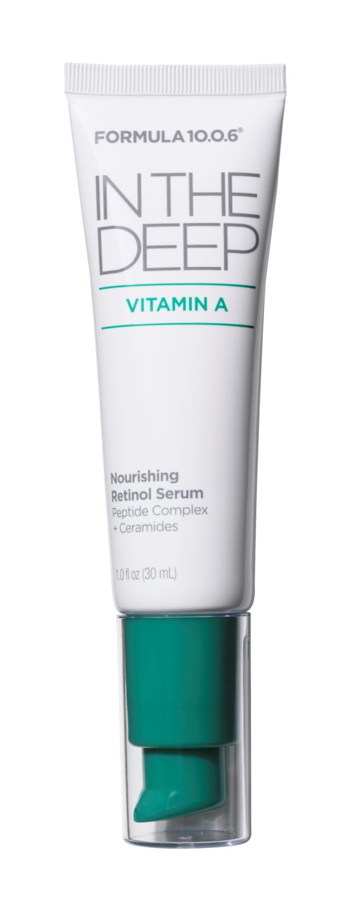 En vit tub med teal- och svart text, märkt 'IN THE DEEP VITAMIN A', med en teal-färgad lock och ett litet öppningshål.